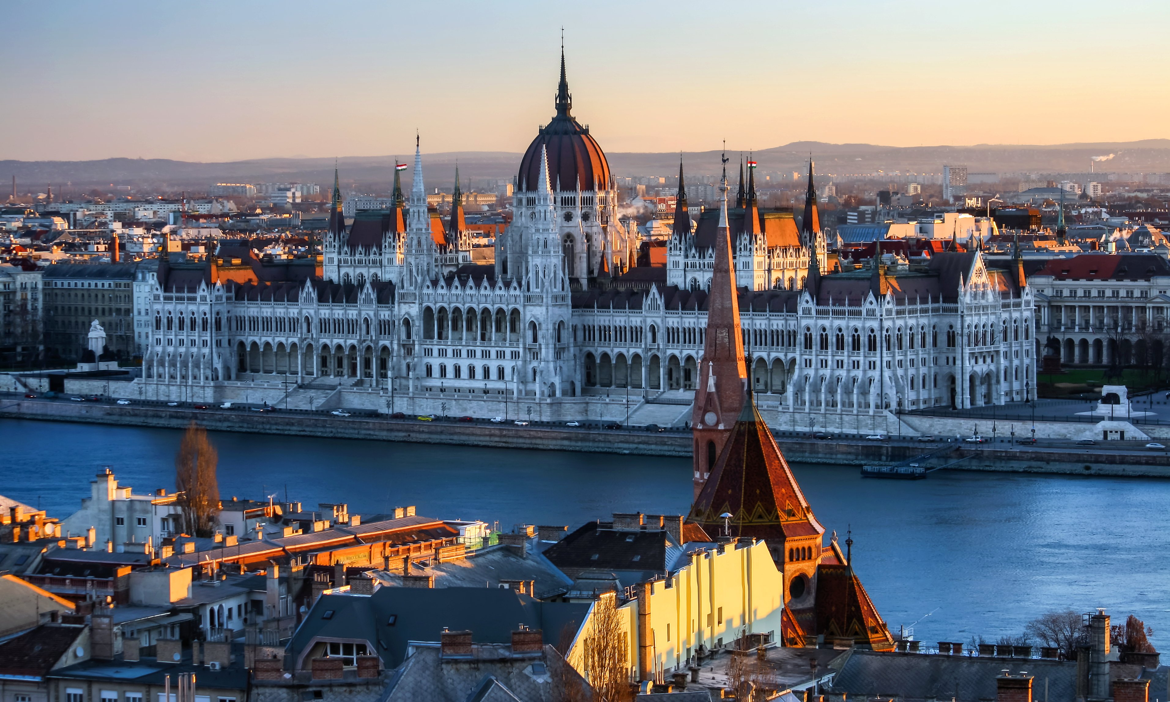The Hungarian Parliament Building on the banks of the Danube in Budapest, an iconic symbol of Hungary and part of the UNESCO-listed Danube riverbanks.