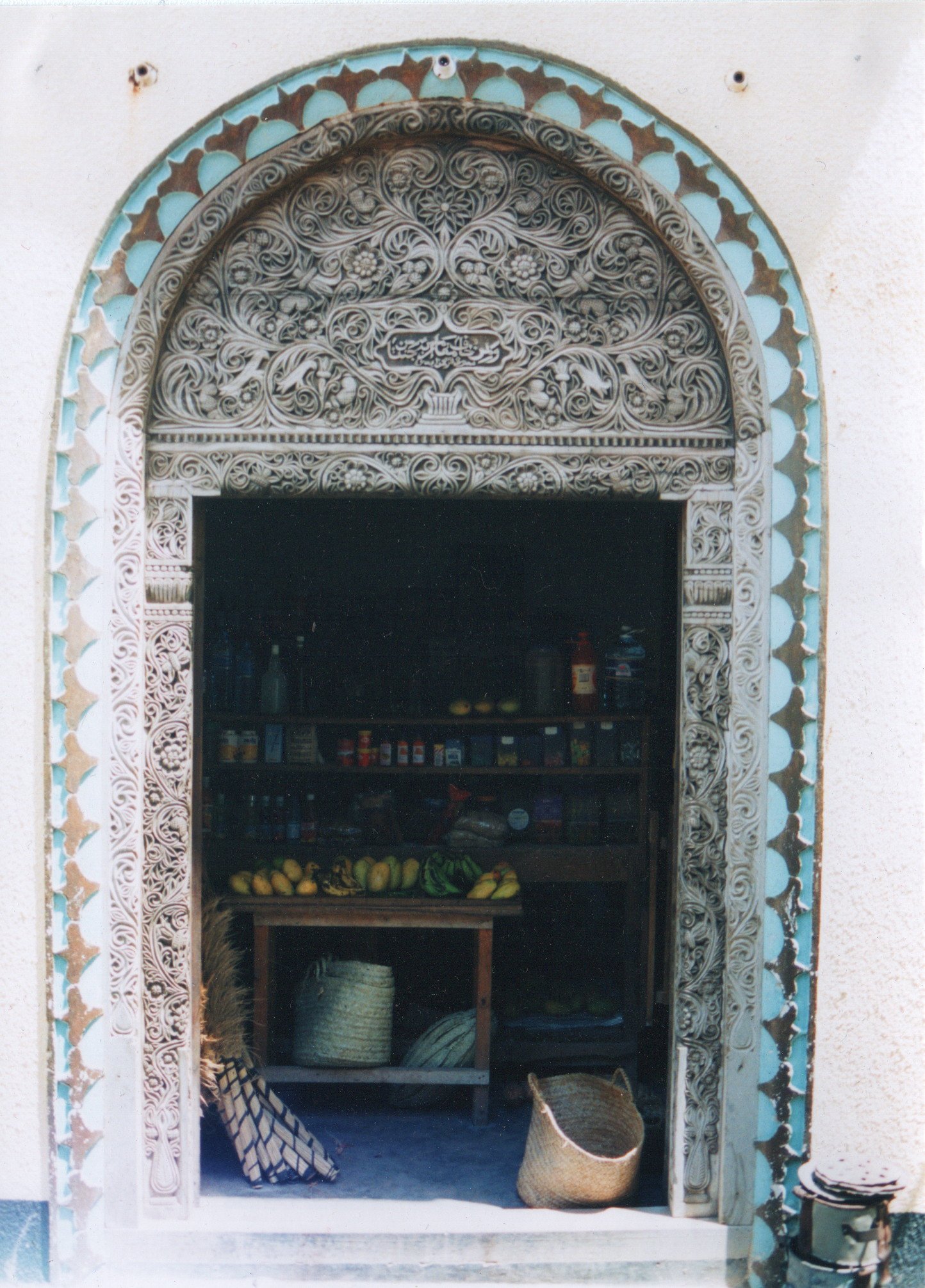 Intricately carved Swahili door in Lamu Old Town, a UNESCO World Heritage Site on Kenya’s coast.