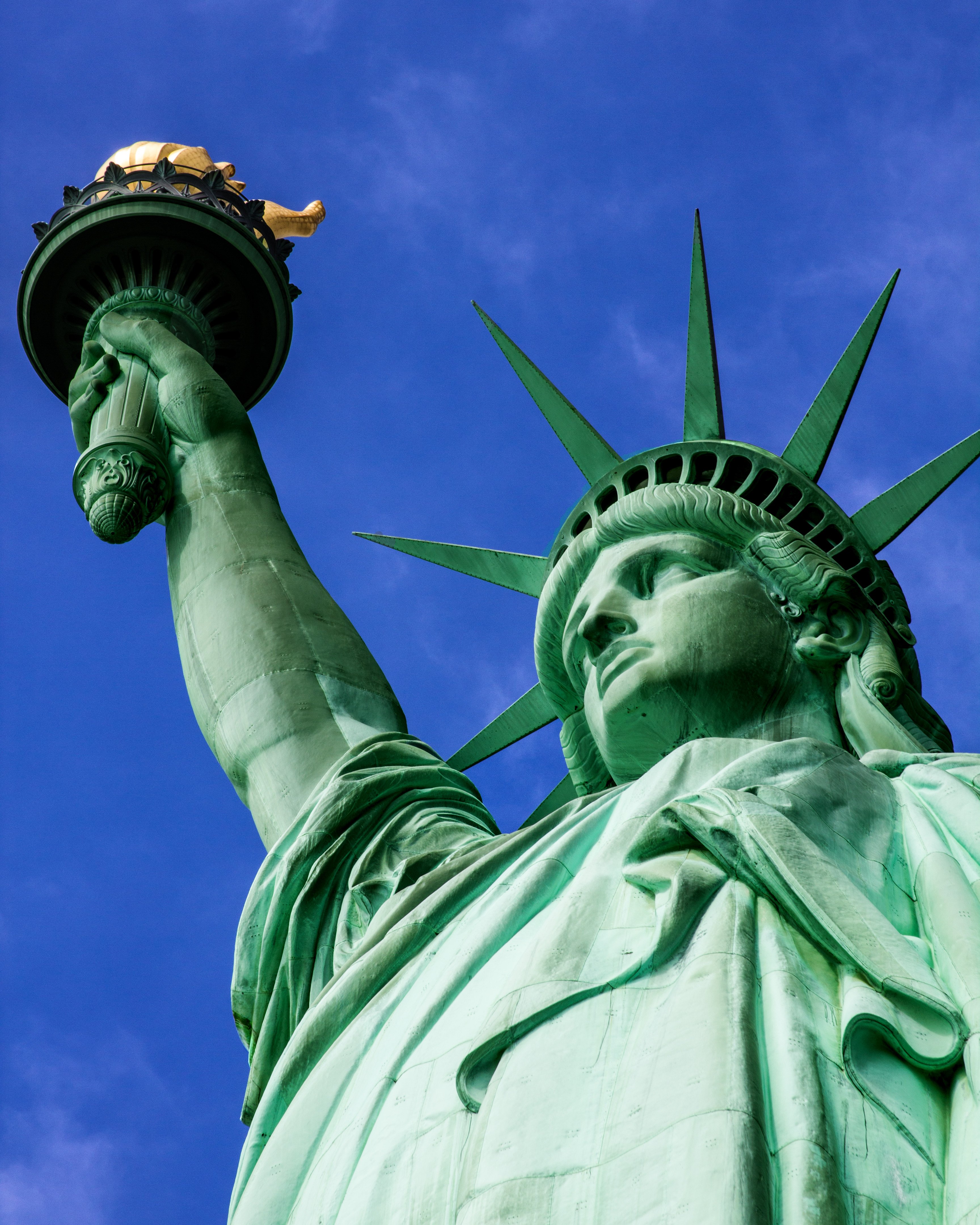 The Statue of Liberty in New York Harbor, a symbol of freedom and a UNESCO World Heritage Site.